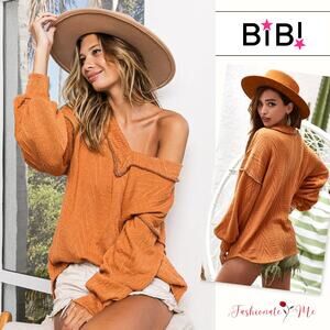 BiBi Textured Exposed Seam Drop Shoulder V-Neck Knit Pullover Sweater | Rust